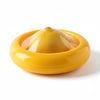 Reusable silicone lemon saver container holding half lemon with flexible seal lid on white background