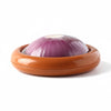 Reusable silicone onion saver container storing half red onion with flexible seal lid on white background